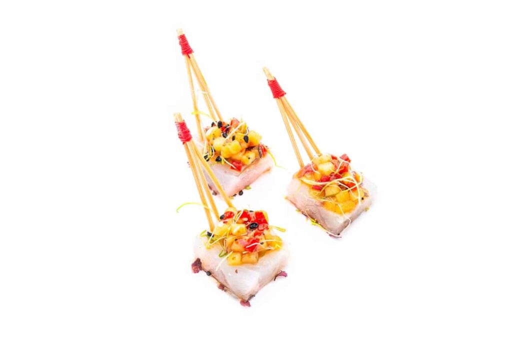 Filet de Bar aux Agrumes, Piquillos et Shichimi